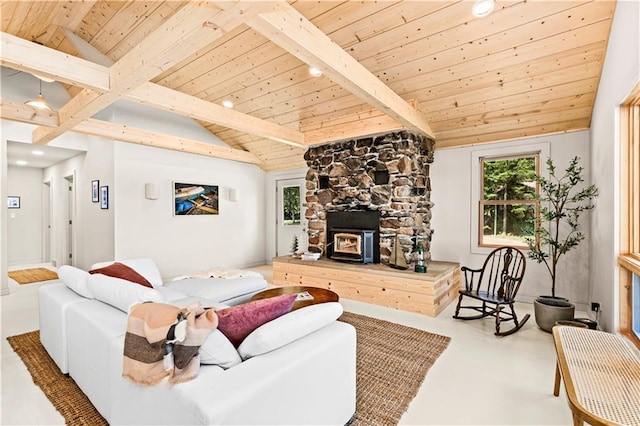 living room with lofted ceiling with beams, plenty of natural light, and wooden ceiling