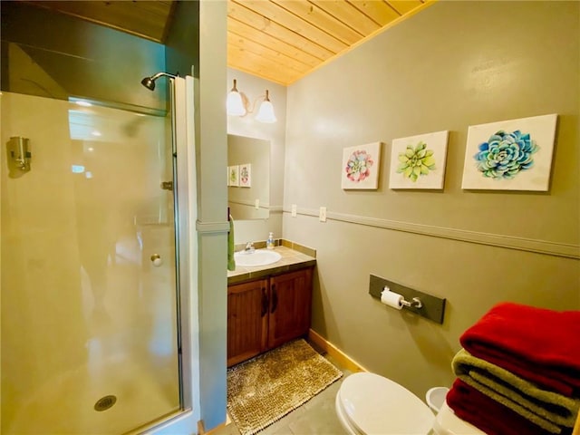 bathroom with toilet, a shower with shower door, wooden ceiling, vanity, and tile patterned flooring