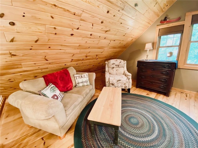 sitting room with wood ceiling, wood-type flooring, and vaulted ceiling