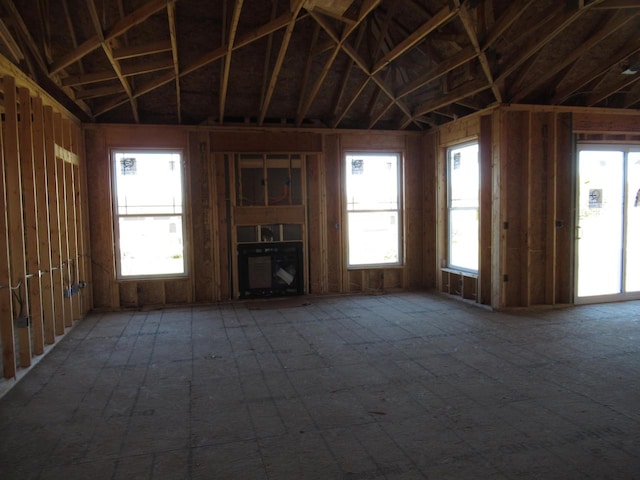 unfurnished living room with a wealth of natural light