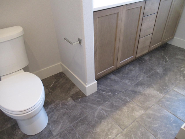 1790 Arbor Vista Pl, West Bend, WI 53095 - bathroom with toilet and baseboards
