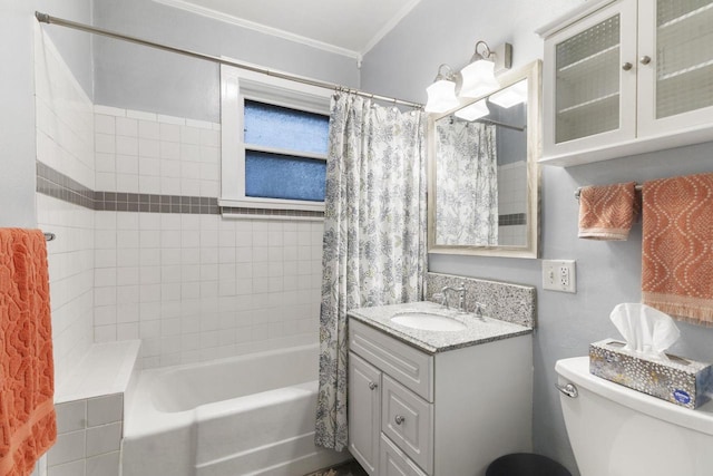 full bathroom featuring vanity, ornamental molding, toilet, and shower / bath combo