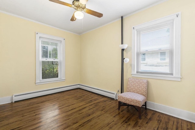 unfurnished room with crown molding, ceiling fan, dark hardwood / wood-style floors, and baseboard heating