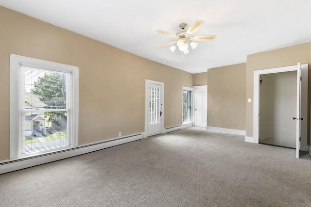 empty room with ceiling fan, a baseboard radiator, and light carpet