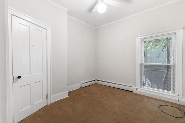 carpeted empty room featuring crown molding, ceiling fan, and a baseboard radiator