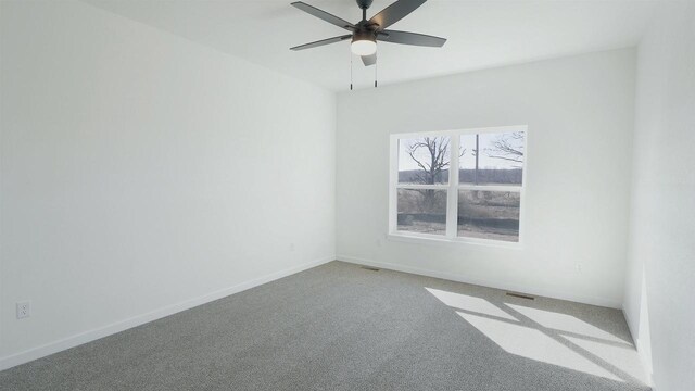 3272 S Bartells Dr, Beloit, WI 53511 - spare room with carpet flooring, baseboards, ceiling fan, and visible vents
