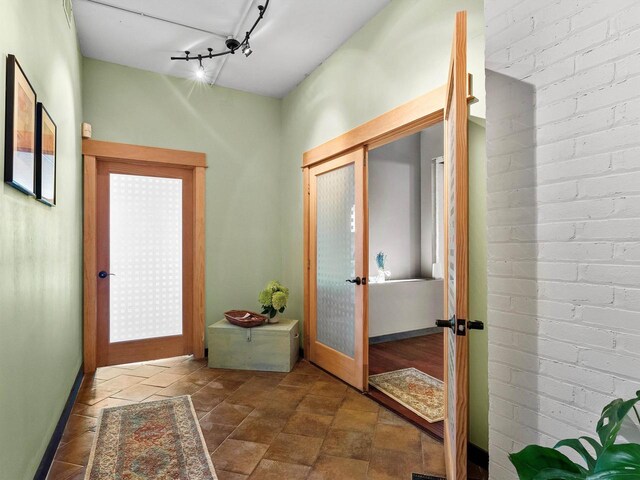 834 N Water St, Sheboygan, WI 53081 - doorway to outside with rail lighting and french doors