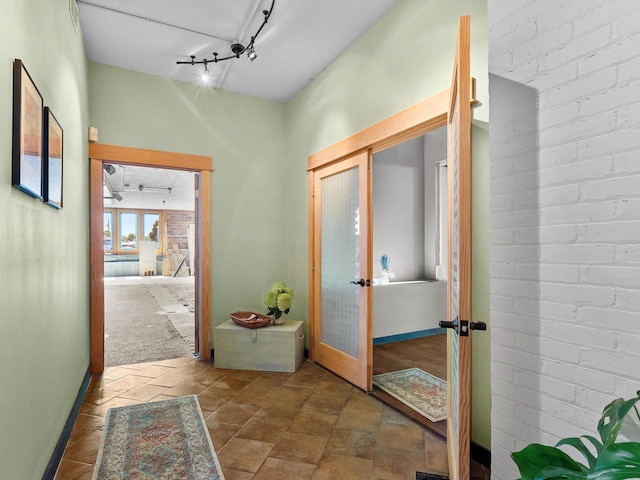 834 N Water St, Sheboygan, WI 53081 - corridor with track lighting, french doors, and carpet flooring