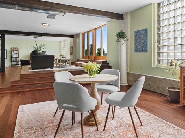 834 N Water St, Sheboygan, WI 53081 - dining area featuring beam ceiling and hardwood / wood-style floors