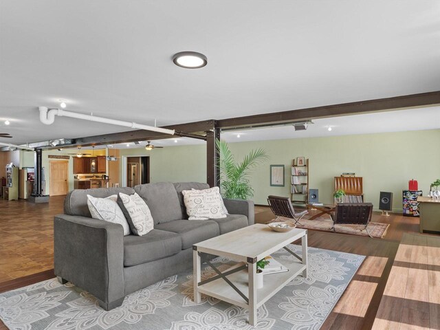 834 N Water St, Sheboygan, WI 53081 - living room with wood-type flooring and beam ceiling