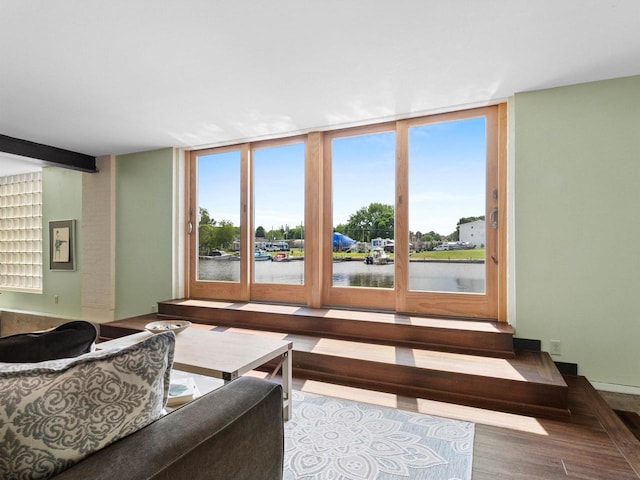 834 N Water St, Sheboygan, WI 53081 - living room featuring a water view, wood-type flooring, and floor to ceiling windows