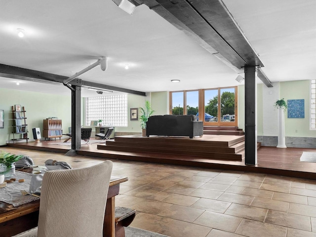 834 N Water St, Sheboygan, WI 53081 - interior space featuring a wood stove and a wealth of natural light