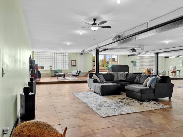 834 N Water St, Sheboygan, WI 53081 - living room featuring ceiling fan and a wood stove