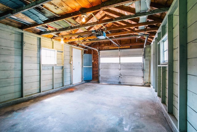 garage featuring a garage door opener