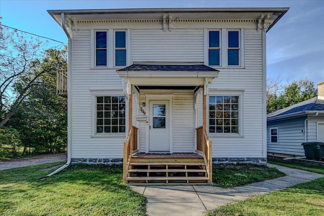 italianate home with a front yard