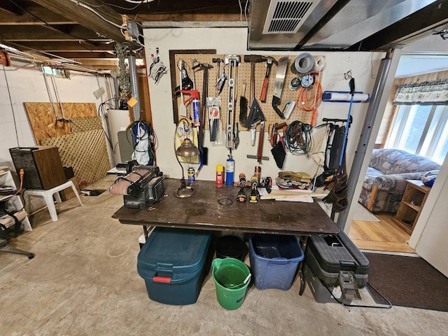 basement with a workshop area