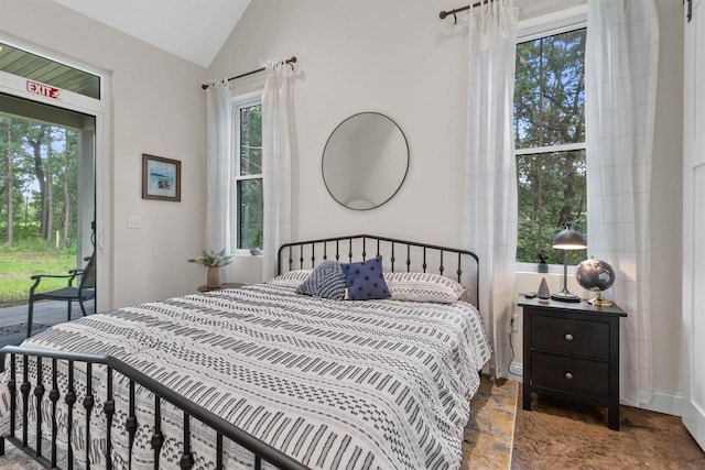 bedroom featuring lofted ceiling