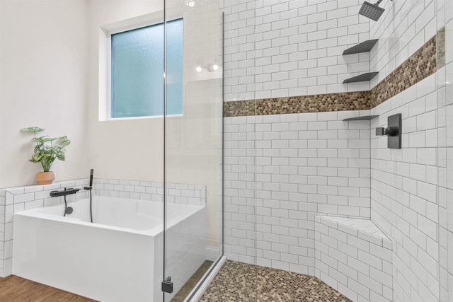 bathroom with independent shower and bath