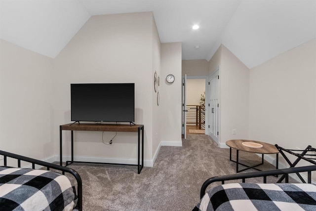 carpeted bedroom featuring vaulted ceiling