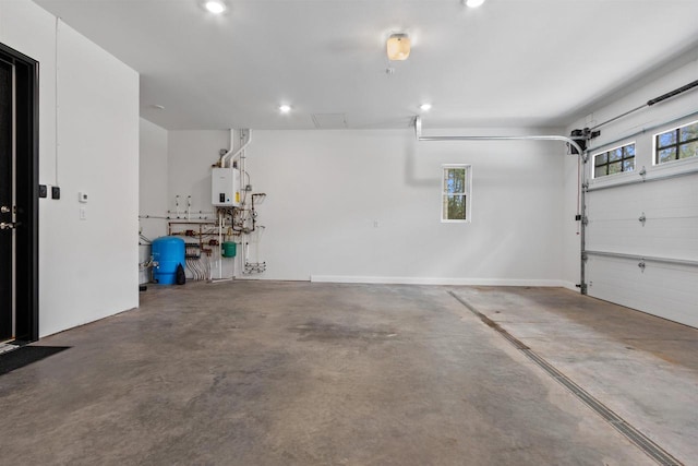 garage featuring tankless water heater