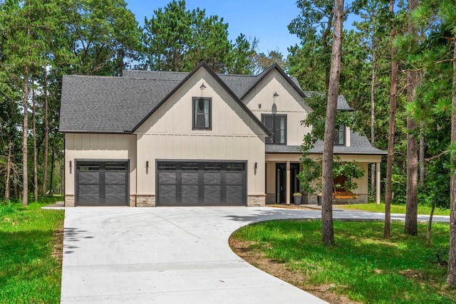 view of front of property featuring a garage