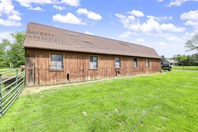 view of property exterior featuring a yard