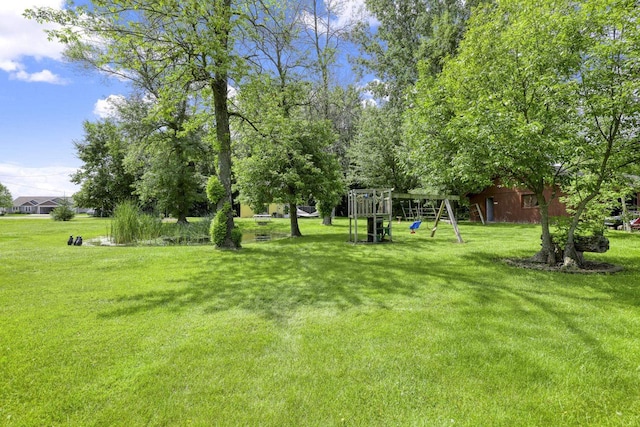 view of yard with a playground
