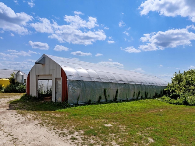W7031 Hickory Ln, Elkhart Lake, WI 53020 - view of outbuilding with an outdoor structure