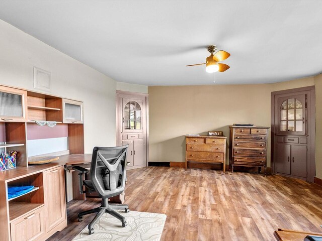 W7031 Hickory Ln, Elkhart Lake, WI 53020 - office area with baseboards, a ceiling fan, and wood finished floors