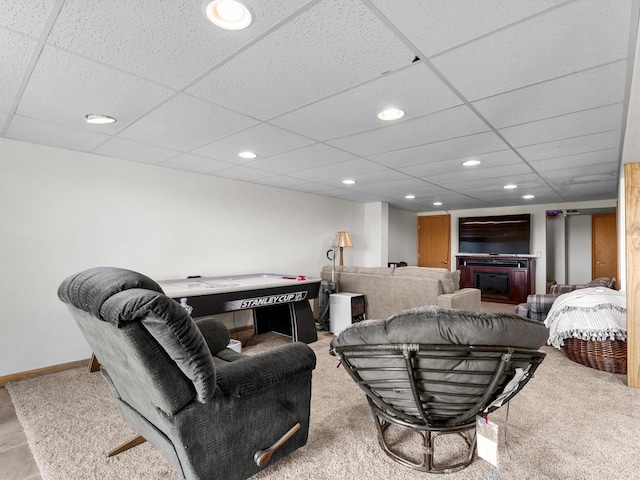 W7031 Hickory Ln, Elkhart Lake, WI 53020 - living area featuring a paneled ceiling, baseboards, light colored carpet, and recessed lighting