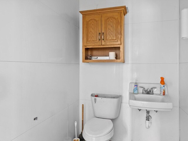 W7031 Hickory Ln, Elkhart Lake, WI 53020 - half bathroom with a sink and toilet