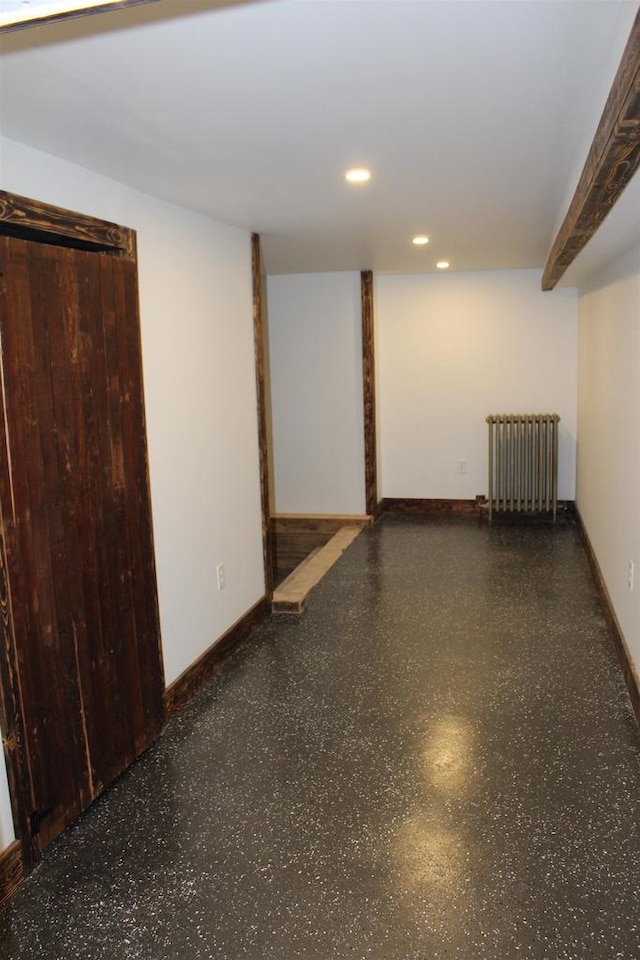 basement with radiator heating unit