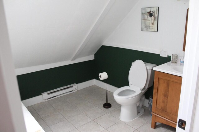 bathroom with toilet, tile patterned floors, a baseboard radiator, lofted ceiling, and vanity