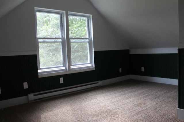 bonus room with carpet floors, vaulted ceiling, and baseboard heating