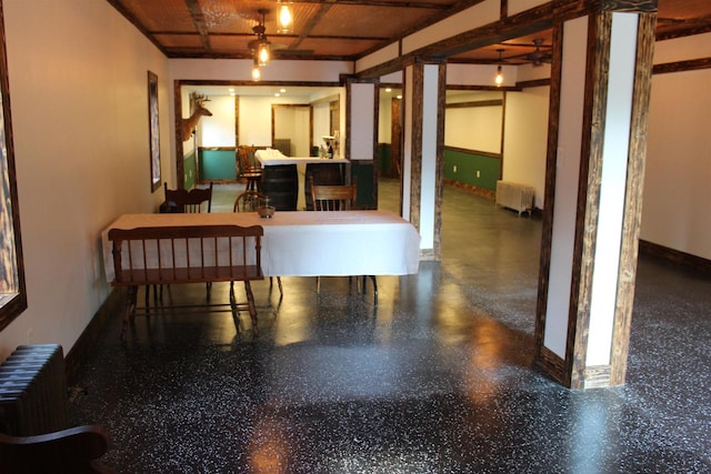 dining room with radiator