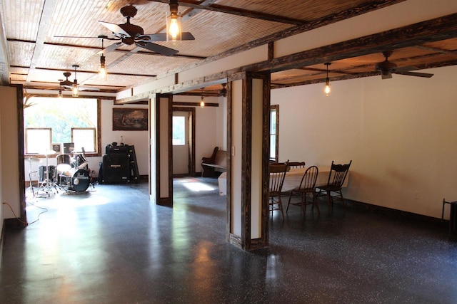 interior space featuring ceiling fan