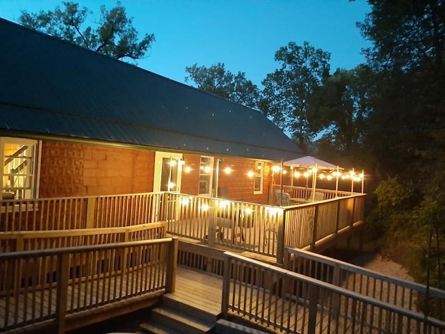 view of deck at dusk