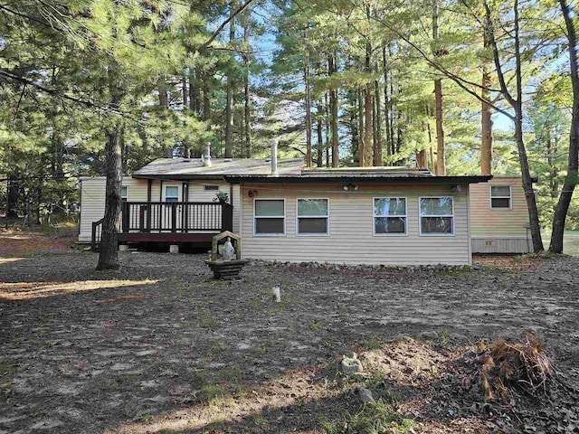 exterior space featuring a wooden deck