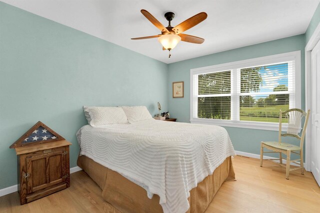 W12203 State Road 23, Ripon, WI 54971 - bedroom featuring ceiling fan and light hardwood / wood-style floors