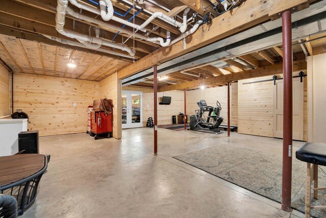 W12203 State Road 23, Ripon, WI 54971 - basement with wood walls and a barn door