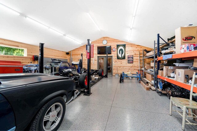 W12203 State Road 23, Ripon, WI 54971 - garage with wood walls and a workshop area