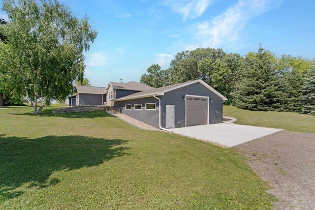 W12203 State Road 23, Ripon, WI 54971 - garage with a yard