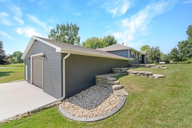 W12203 State Road 23, Ripon, WI 54971 - view of home's exterior featuring an outbuilding, a garage, and a yard