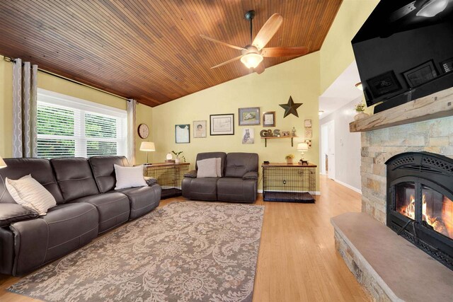 W12203 State Road 23, Ripon, WI 54971 - living room featuring ceiling fan, a fireplace, light hardwood / wood-style flooring, and wooden ceiling