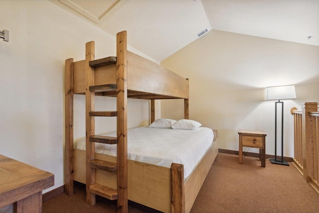 bedroom featuring carpet flooring and vaulted ceiling