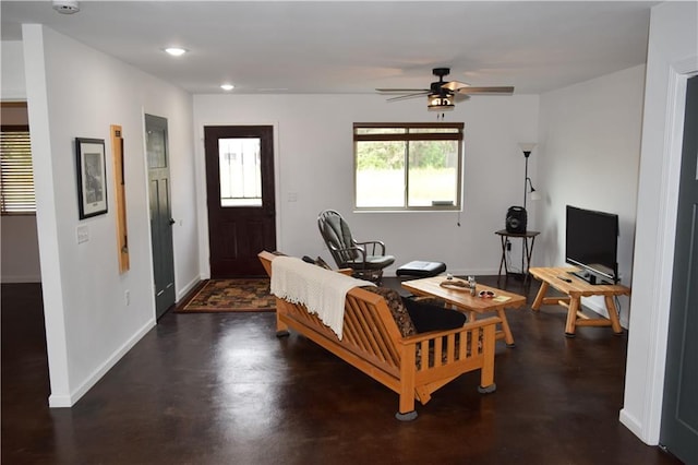 living room featuring ceiling fan