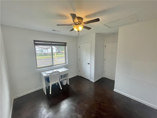 unfurnished office featuring ceiling fan