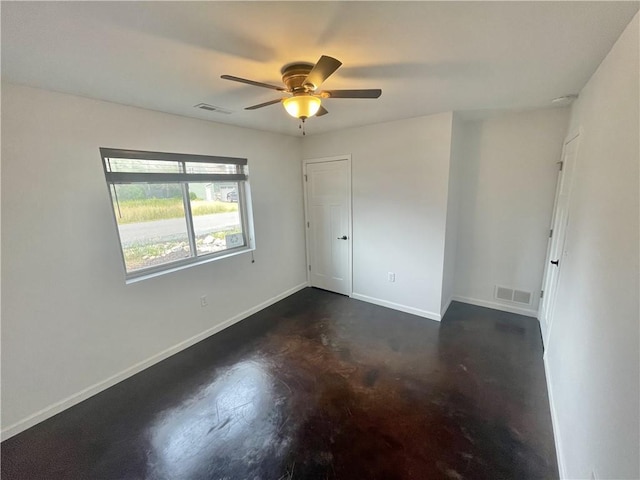 spare room featuring ceiling fan