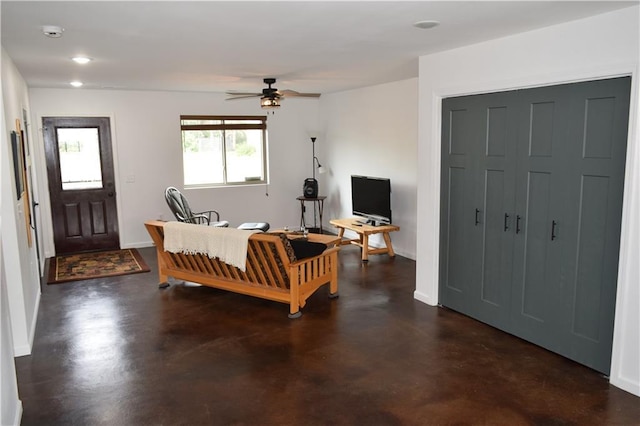 living room featuring ceiling fan