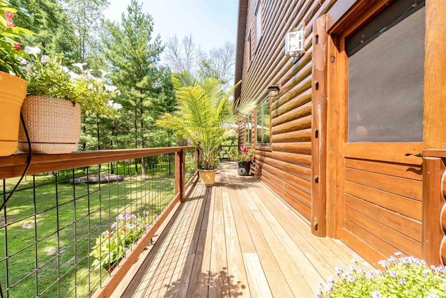 wooden deck with a yard